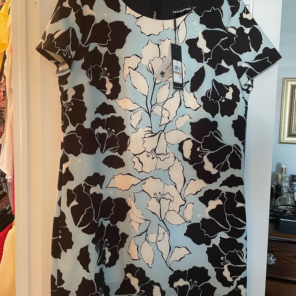 Brand New Calvin Klein sheath dress. Fully lined. Size 12
